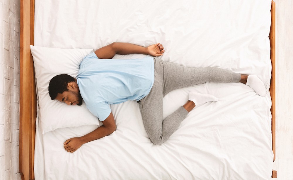 Why Do I Sleep With My Knees Up? - The Pulse Blog